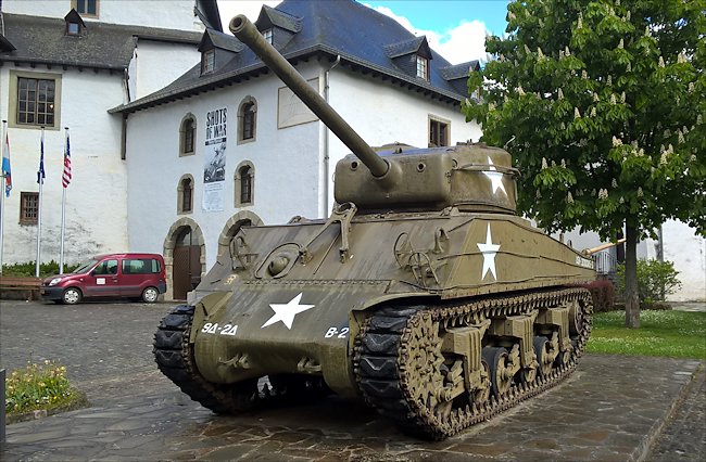 Surviving Battle of the Bulge 1944 M4A3 Sherman Tank in the grounds of Clervaux Castle in Luxembourg