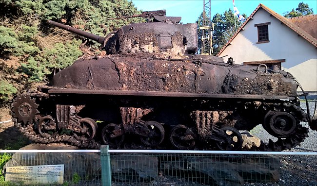 A metal boat shaped shelf was welded around the 
		hull of the Sherman DD 